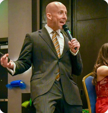 Hypnotist entertaining guests