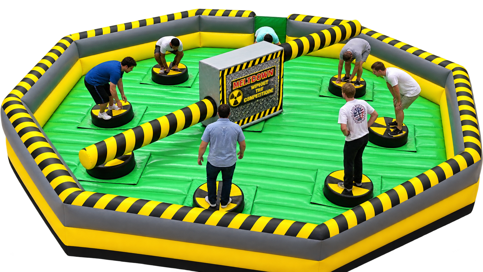 Students competing on the Toxic Meltdown inflatable game