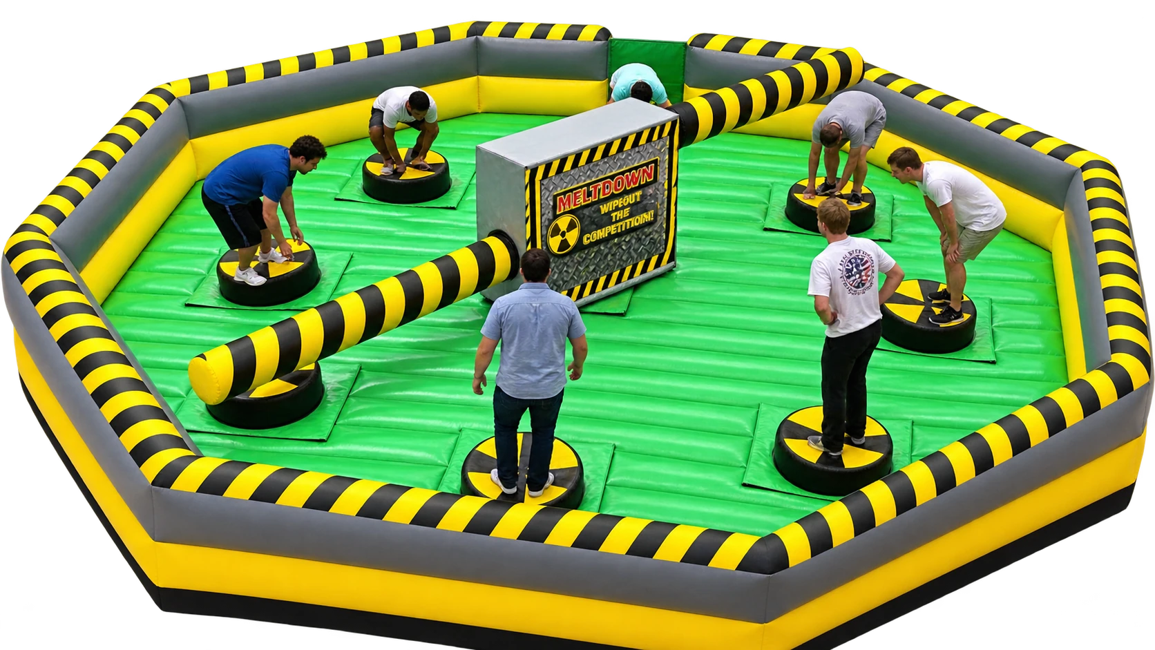 Students competing on the Toxic Meltdown inflatable game